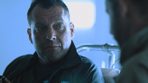 Tom Sizemore as Zek in the sci-fi thriller film 