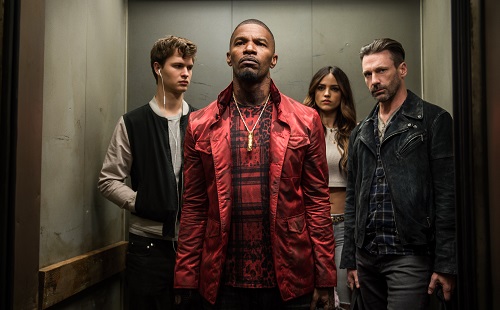 (l to r) Baby (ANSEL ELGORT), Bats (JAMIE FOXX), Darling (EIZA GONZALEZ) and Buddy (JON HAMM) decide on doing the heist in TriStar Pictures' BABY DRIVER. Sony Pictures Entertainment 2017, All Rights Reserved.