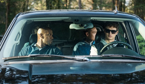 Baby (ANSEL ELGORT, front right), Bats (JAMIE FOXX, front left), JD (LANNY JOON, back right), Eddie (FLEA BALZARY, back left) wait in the car in TriStar Pictures' BABY DRIVER. Sony Pictures Entertainment 2017, All Rights Reserved.