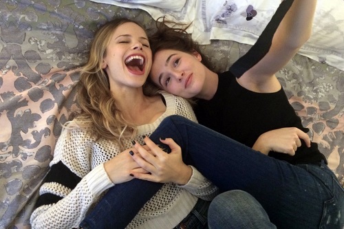 Halston Sage and Zoey Deutch in BEFORE I FALL, photo courtesy Awesomeness Films/Open Road Films, All rights reserved.