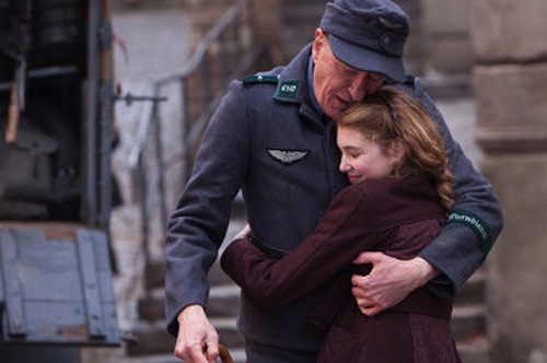 Sophie Nelisse as Liesel and Geoffrey Rush as Hans in The Book Thief. 2013 Jules Heath / Twentieth Century Fox.