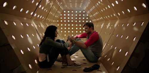 DAVE MADE A MAZE - Meera Rohit Kumbhani and Nick Thune in the Kubrick corridor, courtesy Gravitas Ventures 2017, All Rights Reserved.