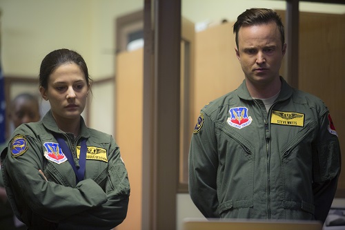 Phoebe Fox (left) stars as Carrie Gershon and Aaron Paul (right) stars as Steve Watts in Gavin Hood's EYE IN THE SKY, a Bleecker Street release. Credit: Keith Bernstein / Bleecker Street