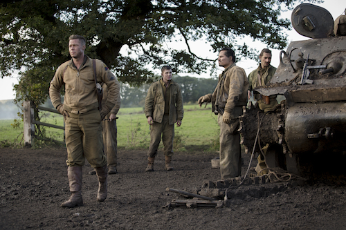 Wardaddy (Brad Pitt) and his crew, Norman Ellison(Logan Lerman), Trini Garcia (Michael PeÃ±a) and Boyd Swan (Shia LaBeouf) in Columbia Pictures' FURY. Photo Credit: Giles Keyte. 2014 CTMG, Inc. All Rights Reserved. ALL IMAGES ARE PROPERTY OF SONY PICTURES ENTERTAINMENT INC. FOR PROMOTIONAL USE ONLY.