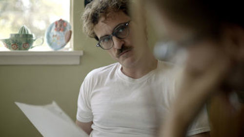 Joaquin Phoenix as Theodore in Her. 2014 Warner Bros. Pictures. Joaquin Phoenix as Theodore in Her. 2014 Warner Bros. Pictures.