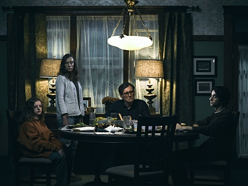Milly Shapiro, Toni Collette, Gabriel Byrne, and Alex Wolff in Hereditary, photo by James Minchin, courtesy of A24. Milly Shapiro, Toni Collette, Gabriel Byrne, and Alex Wolff in Hereditary, photo by James Minchin, courtesy of A24.