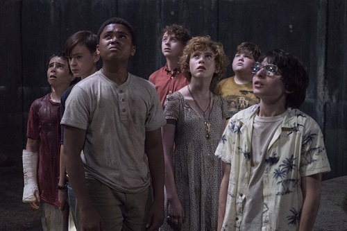 (l-r) JACK DYLAN GRAZER as Eddie Kaspbrak, JAEDEN LIEBERHER as Bill Denbrough, CHOSEN JACOBS as Mike Hanlon, WYATT OLEFF as Stanley Uris, SOPHIA LILLIS as Beverly Marsh, JEREMY RAY TAYLOR as Ben Hanscom and FINN WOLFHARD as Richie Tozier in New Line Cinema's horror thriller IT, a Warner Bros. Pictures release. Photo by Brooke Palmer, © 2017 WARNER BROS. ENTERTAINMENT INC. AND RATPAC-DUNE ENTERTAINMENT LLC.  ALL RIGHTS RESERVED.