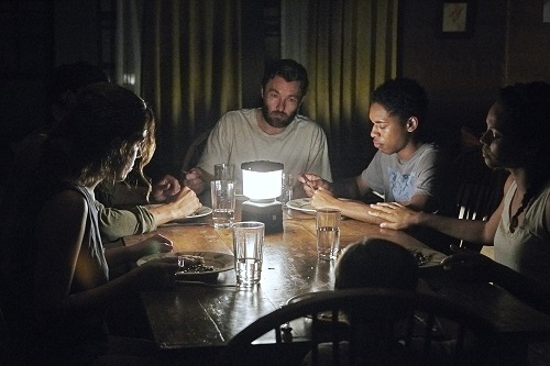 Riley Keough, Christopher Abbott, Joel Edgerton, Kelvin Harrison Jr., Carmen Ejogo, and Griffin Robert Faulkner in IT COMES AT NIGHT, Photo by Eric McNatt courtesy A24. Riley Keough, Christopher Abbott, Joel Edgerton, Kelvin Harrison Jr., Carmen Ejogo, and Griffin Robert Faulkner in IT COMES AT NIGHT, Photo by Eric McNatt courtesy A24.