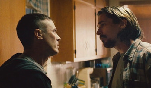 WCasey Affleck and Christian Bale in Out of the Furnace. 2013 Relativity Media.