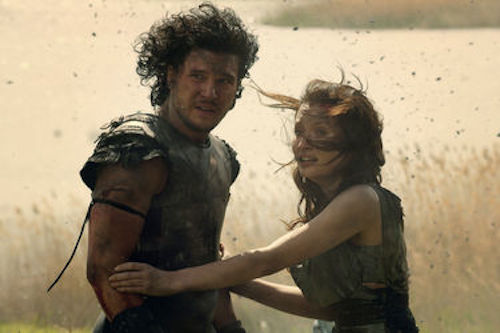 Kit Harington as Milo and Emily Browning as Cassia in Pompeii. 2014 Caitlin Cronenberg / Sony Pictures. Kit Harington as Milo and Emily Browning as Cassia in Pompeii. 2014 Caitlin Cronenberg / Sony Pictures.