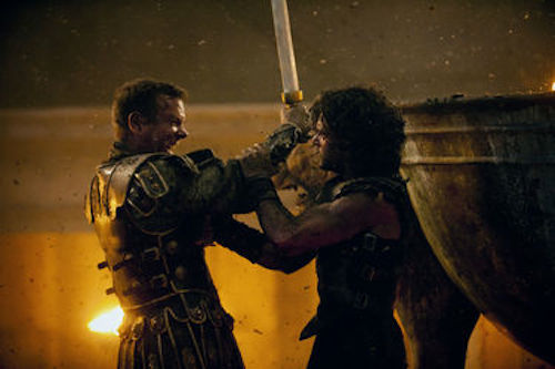 Kit Harington as Milo and Kiefer Sutherland as Corvus in Pompeii. 2014 George Kraychyk / Sony Pictures. Kit Harington as Milo and Kiefer Sutherland as Corvus in Pompeii. 2014 George Kraychyk / Sony Pictures.