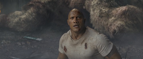 DWAYNE JOHNSON as Davis Okoye in New Line Cinema's and ASAP Entertainment's action adventure RAMPAGE, a Warner Bros. Pictures release. Photo Courtesy of Warner Bros. Pictures, © 2018 WARNER BROS. ENTERTAINMENT INC. DWAYNE JOHNSON as Davis Okoye in New Line Cinema's and ASAP Entertainment's action adventure RAMPAGE, a Warner Bros. Pictures release. Photo Courtesy of Warner Bros. Pictures, © 2018 WARNER BROS. ENTERTAINMENT INC.