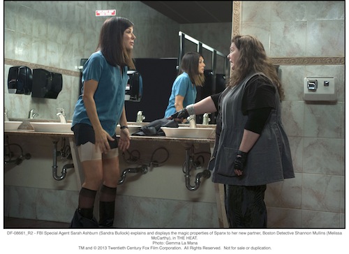 FBI Special Agent Sarah Ashburn (Sandra Bullock) explains and displays the magic properties of Spanx to her new partner, Boston Detective Shannon Mullins (Melissa McCarthy), in THE HEAT. Photo: Gemma La Mana - TM & 2013 Twentieth Century Fox Film Corporation. All Rights Reserved.