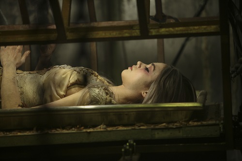 India Eisley as Briar Rose in the thriller film 