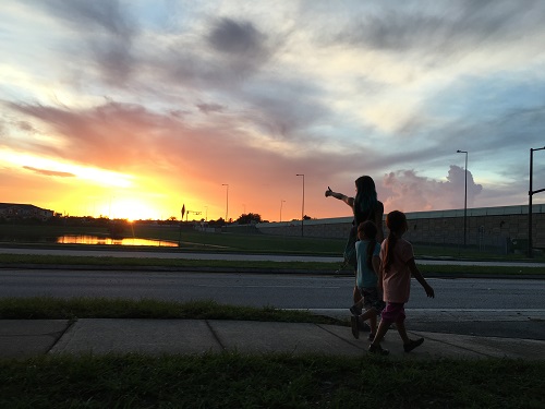 Bria Vinaite, Valeria Cotto, and Brooklynn Prince in The Florida Project. Photo by Marc Schmidt, courtesy of A24.