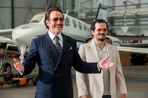 (l to r) Bryan Cranston stars as undercover U.S. Customs agent Robert Mazur and John Leguizamo as his partner Emir Abreu in THE INFILTRATOR, a Broad Green Pictures release.