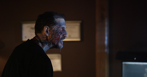 John Speredakos as Dr. Michael Slovak in the horror film THE MIND'S EYE, an RLJ Entertainment release. Photo credit Joe Begos. John Speredakos as Dr. Michael Slovak in the horror film THE MIND'S EYE, an RLJ Entertainment release. Photo credit Joe Begos.