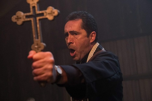 DEMIAN BICHIR as Father Burke in New Line Cinema's horror film THE NUN, a Warner Bros. Pictures release. Photo by Justin Lubin.