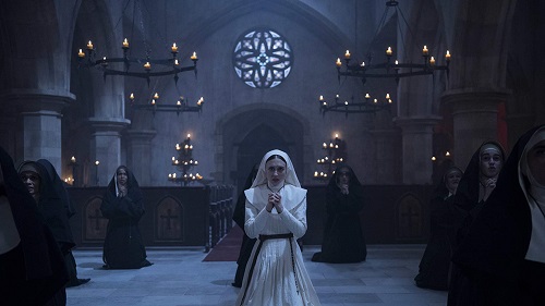 (Center) TAISSA FARMIGA as Sister Irene in New Line Cinema's horror film THE NUN, a Warner Bros. Pictures release. Photo by Martin Maguire.