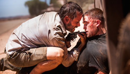Robert Pattinson and Guy Pearce in The Rover. 2014 A24 Films.