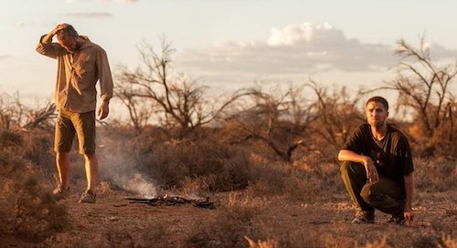 Robert Pattinson and Guy Pearce in The Rover. 2014 A24 Films. Robert Pattinson and Guy Pearce in The Rover. 2014 A24 Films.