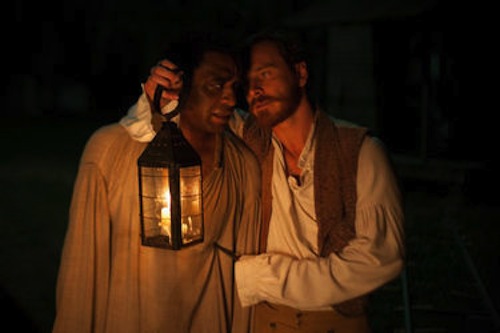 Chiwetel Ejiofor as Solomon Northup and Michael Fassbender as Edwin Epps in Twelve Years a Slave. 2013 Fox Searchlight.