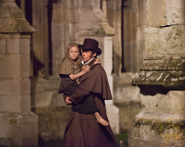 ISABELLE ALLEN as young Cosette and HUGH JACKMAN as Jean Valjean in 