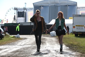 Luke Treadaway as Adam and Natalia Tena as Morello handcuffed together during the filming of Tonight You're Mine.