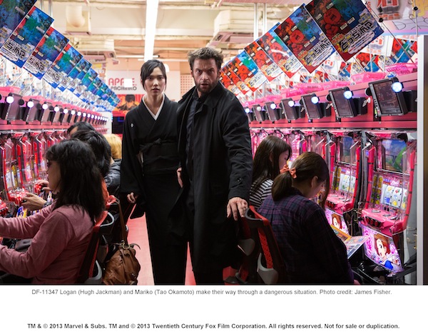 Logan (Hugh Jackman) and Mariko (Tao Okamoto) make their way through a dangerous situation. Photo credit: James Fisher.