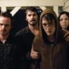 (L to R) Francis (AARON PAUL), Krug (GARRET DILLAHUNT), Justin (SPENCER TREAT CLARK) and Sadie (RIKI LINDHOME) knock on the Collingswood in The Last House on the Left