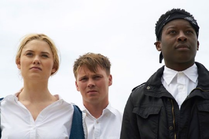 Virginia Gardner, Sam Strike, and Brandon Micheal Hall in Monster Party, image courtesy RLJE Films.