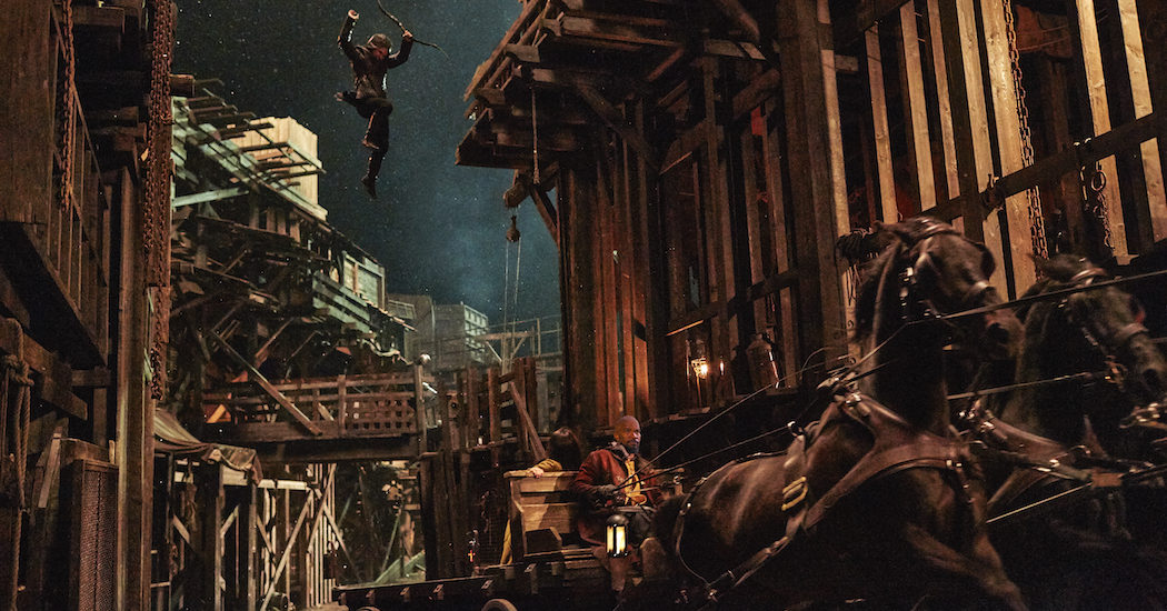 Robin (Taron Egerton, left) and John (Jamie Foxx, right) in Robin Hood. Photo credit: Attila Szvacsek.