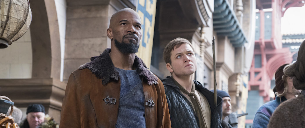 Robin (Taron Egerton, left) and John (Jamie Foxx, right) in Robin Hood. Photo credit: Attila Szvacsek.