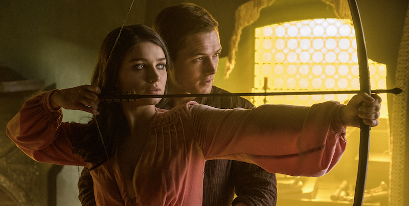 Marian (Eve Hewson) and Robin (Taron Egerton) in Robin Hood. Photo Credit: Attila Szvacsek.