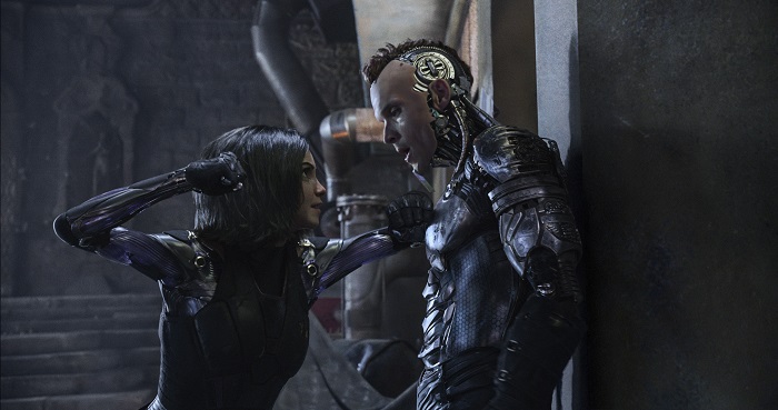 Rosa Salazar (as Alita) and Ed Skrein (as Zapan) star in Twentieth Century Fox’s ALITA: BATTLE ANGEL. Photo Credit: Courtesy Twentieth Century Fox.