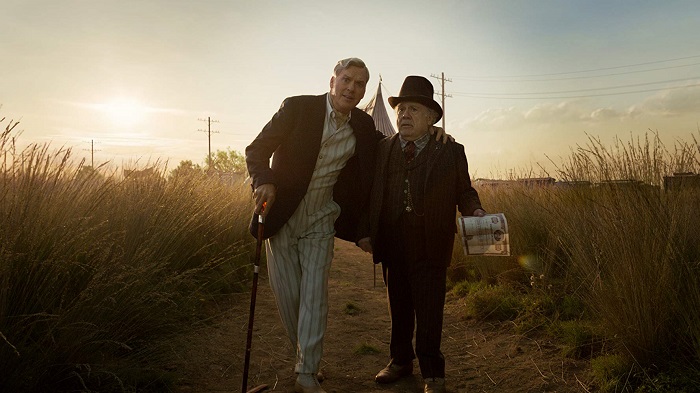 Michael Keaton and Danny DeVito in Dumbo, courtesy Walt Disney Studios Motion Pictures.