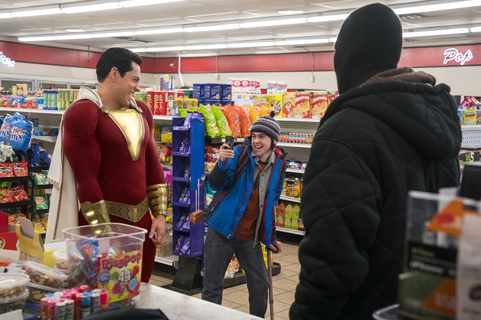 (l-r) ZACHARY LEVI as Shazam and JACK DYLAN GRAZER as Freddy Freeman in New Line Cinema’s action adventure “SHAZAM!,” a Warner Bros. Pictures release. Photo by Steve Wilkie/ & © DC Comics.